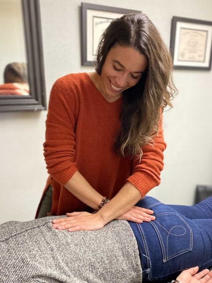 Jessica providing treatment to a patient